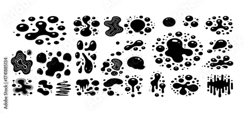 Inkblots of diverse shapes create an artistic collage with solid black forms and transparent droplets, offering a bold graphic resource on a stark white canvas