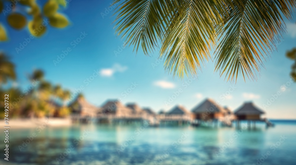 Naklejka premium Blurred tropical island resort background, overwater bungalows, crystal clear lagoon, bright sunny sky, palm leaves in soft focus, dreamy vacation blur, large blank area with copy space for promotion.