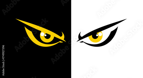 Intense yellow eyes looking fiercely with sharp eyebrows on split black and symbolizing contrast and alertness isolated on white background