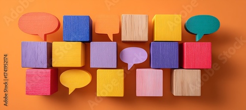 Colorful speech bubbles and building blocks arranged creatively symbolizing communication and ideas
