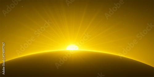 A bright orange sun glows in the summer sky at sunrise over the ocean horizon