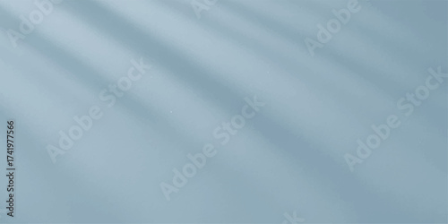 Blue silk satin fabric texture background with smooth flowing waves