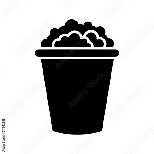 Popcorn bucket icon black and white cinema snack food and drink movie time.