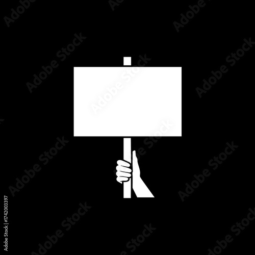 Hand holding blank protest sign or message board.