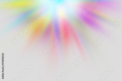 Papier peint Vibrant colorful sunburst effect radiating bright light with rainbow hues on