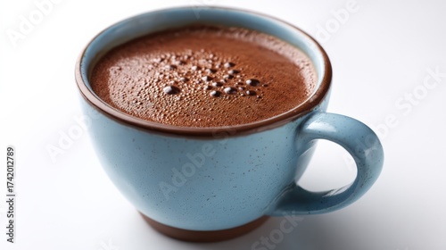 Close up of a blue coffee cup with rich foam
