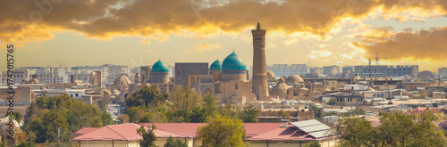 Panorama cityscape with Mir-i-Arab Madrasa Kalyan minaret and Poi Kalyan Mosque at Bukhara city, Uzbekistan. View over the Old City.