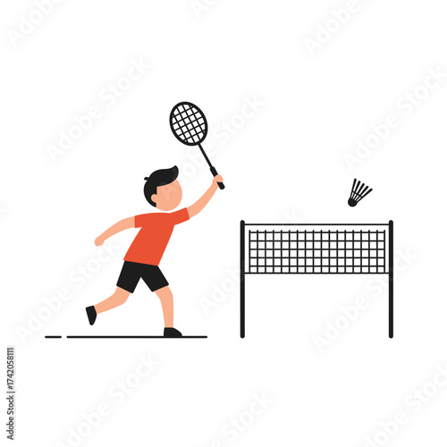Energetic young man playing badminton outdoors, hitting shuttlecock over the net with a racket.