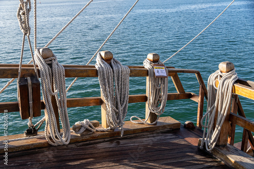 Santander, Spain. Close view of the rigging of the replica of the Santa Maria, showing the wooden blocks and pulleys used to adjust the sails of the historic 15th century caravel