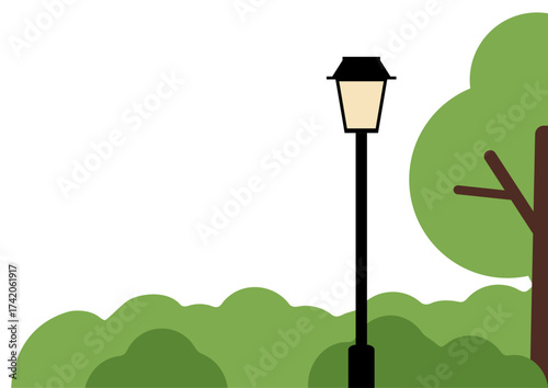Street lamp with green bushes and tree trunk element for abstract landscape background design. Outdoor lighting concept.