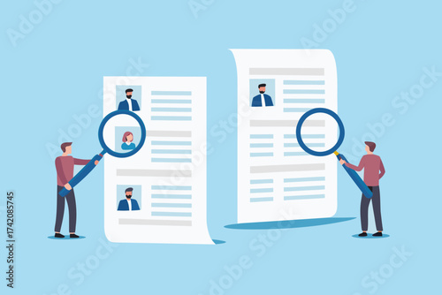 Two recruiters examine resumes using magnifying glasses to find the best candidate for a job
