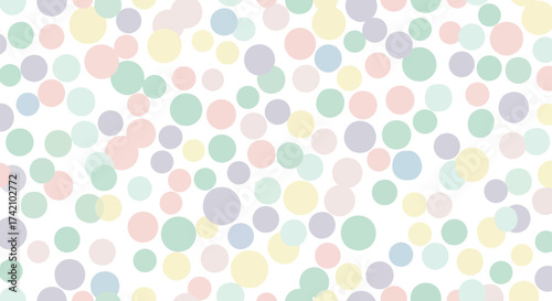 Soft pastel colored polka dots scattered on, abstract pattern
