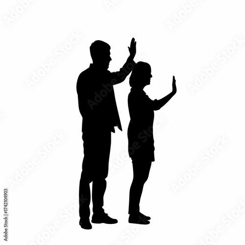 Silhouette of a couple arguing with raised hands isolated on white background