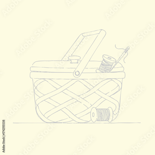 Handcrafted sewing basket filled with spools of thread, sewing needle, and sewing accessories for creative textile projects