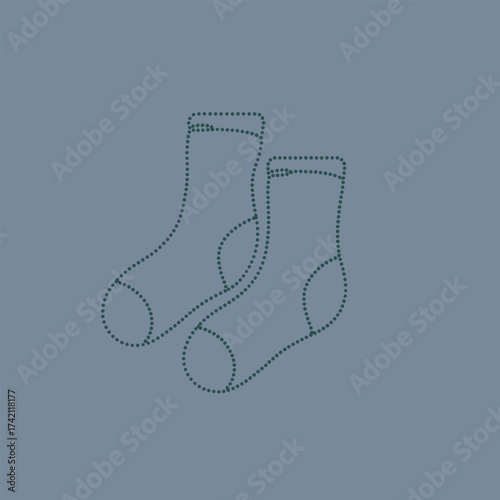 Pair of cozy, knitted socks with a simple design, perfect for keeping feet warm during cold weather or lounging at home