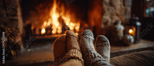 Cozy winter evening by fireplace with warm socks