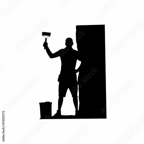 Silhouette of a painter creating a large outdoor mural isolated on white background