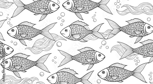 A school of fish swims in the deep blue ocean water.