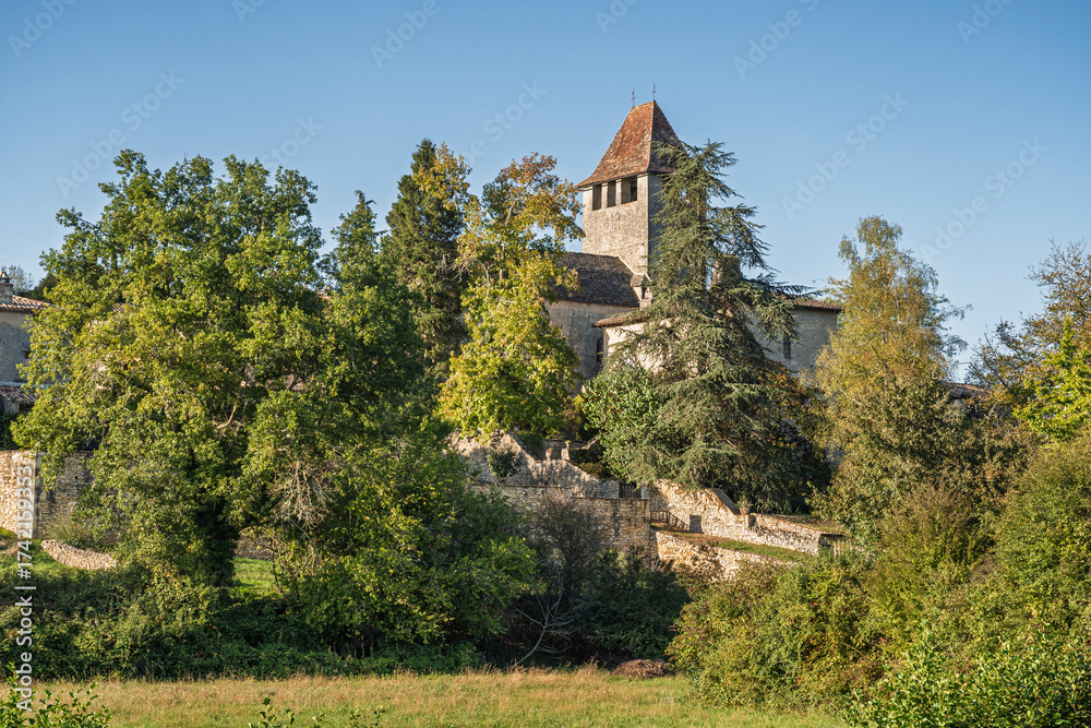 Fototapeta premium Scenic rural landscape view of historic Saint Avit medieval village and church, Lacapelle-Biron, Lot-et-Garonne, France