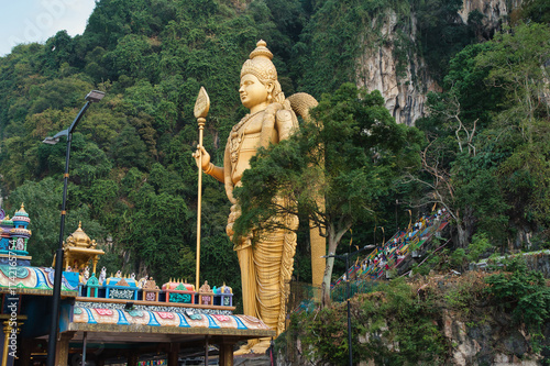 Photography The statue of the god Murugan and the entrance to the Batu Caves, near Kuala Lumpur, Malaysia