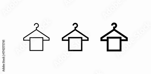 towel on clothes hanger icon sign vector