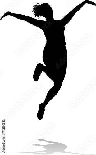 A happy woman jumping for j...