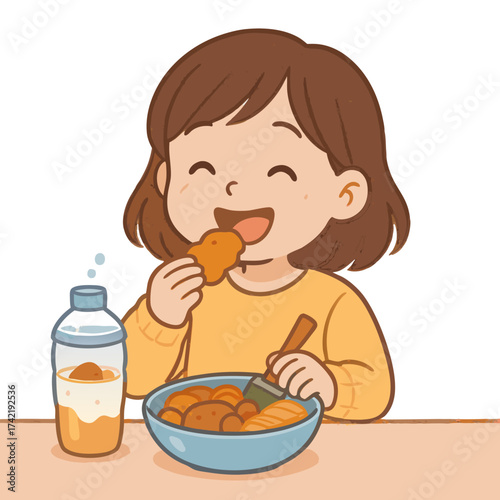 Joyful child happily eating fried chicken and fries.