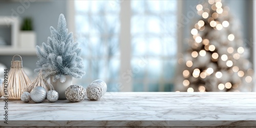 Elegant Christmas arrangement on marble top with a blurred tree in background.