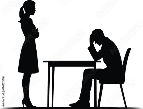 Silhouette of woman standing over man sitting at desk in despair editable stock