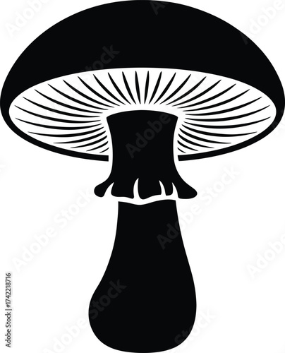Striking black silhouette of a single mushroom with detailed gills on a white background