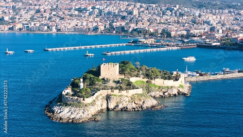 Aerial View of Pigeon Island (Güvercinada) in Kusadasi, Turkey – Historic Fortress Surrounded by the Aegean Sea under Light Clouds