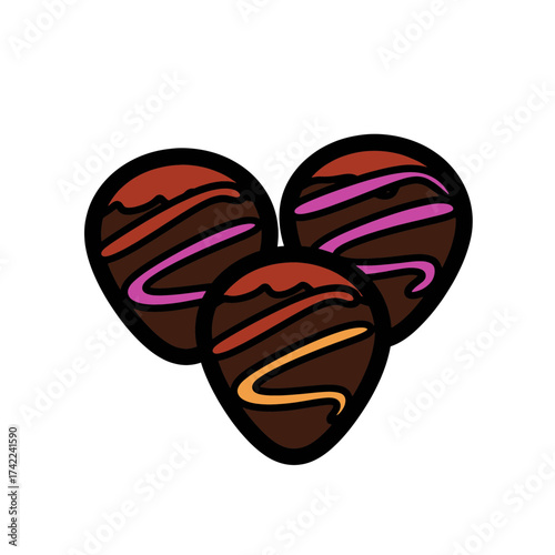 Three chocolate truffles with colorful drizzle delicious dessert.