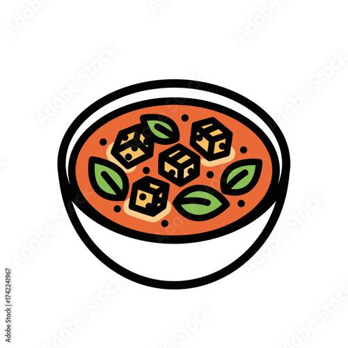 Delicious bowl of soup with tofu and basil leaves a culinary delight.