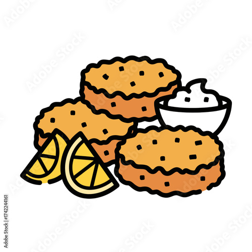 Delicious golden fried chicken nuggets with lemon slices and dipping sauce.