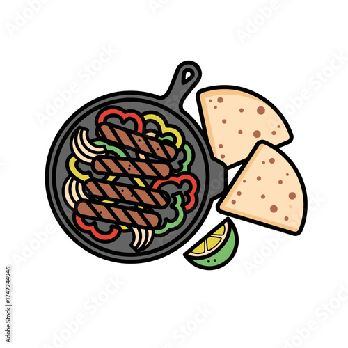 Delicious sizzling fajitas served with tortillas and lime wedge.