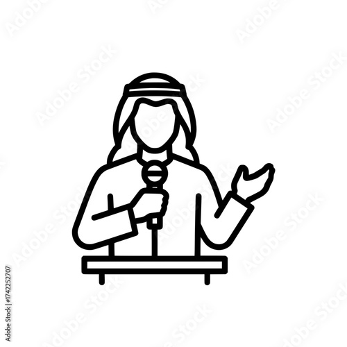 Arab man speaking at a conference with microphone and gesture.