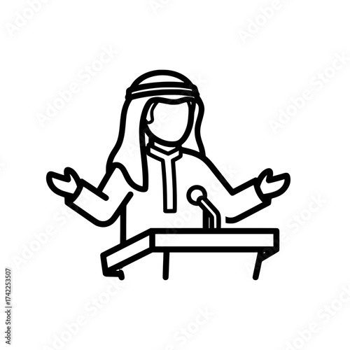 Arab man speaking at a podium with microphone giving a speech.