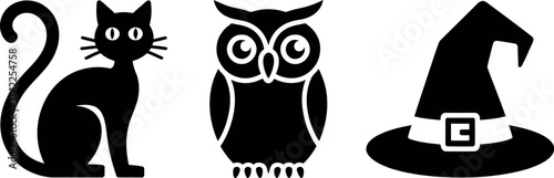 Iconic Halloween symbols: black cat, owl, and witch hat in silhouette