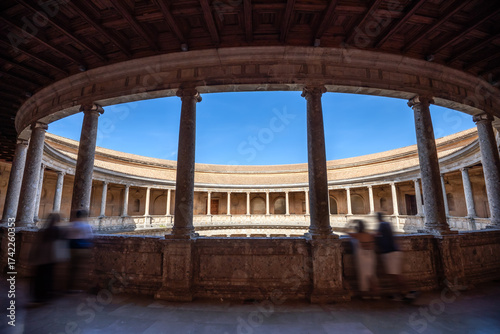 Interior of the Renaissance palace of Charles V in Granada, Andalusia, Spain, with contrasting lighting