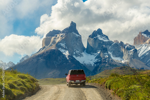 A sport utility vehicle (SUV) driving in Torres del Paine national park, Patagonia, Chile.