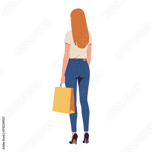 Woman with shopping bag standing with her back turned.