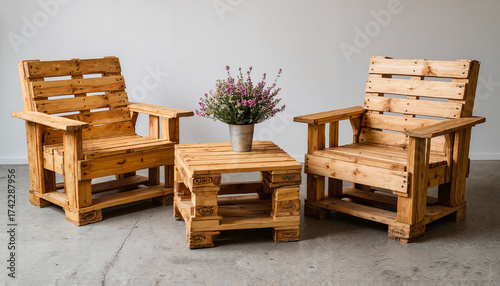 Recycled wooden pallet furniture set with two chairs and a table