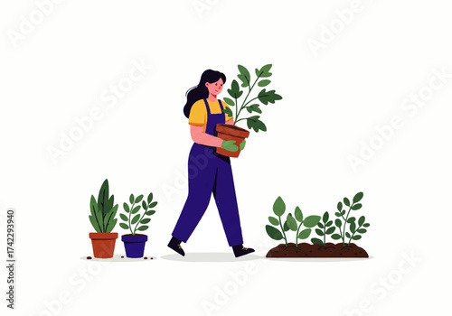A woman in overalls carries a potted tomato plant towards a garden bed, with other potted plants nearby.