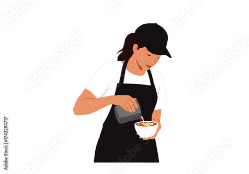 A barista wearing an apron and cap carefully pours steamed milk from a metal pitcher into a cup of coffee, creating latte art.