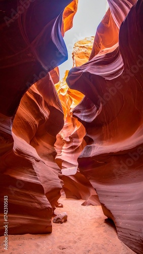 Natural sandstone formations carved by erosion, creating stunning abstract lightplay