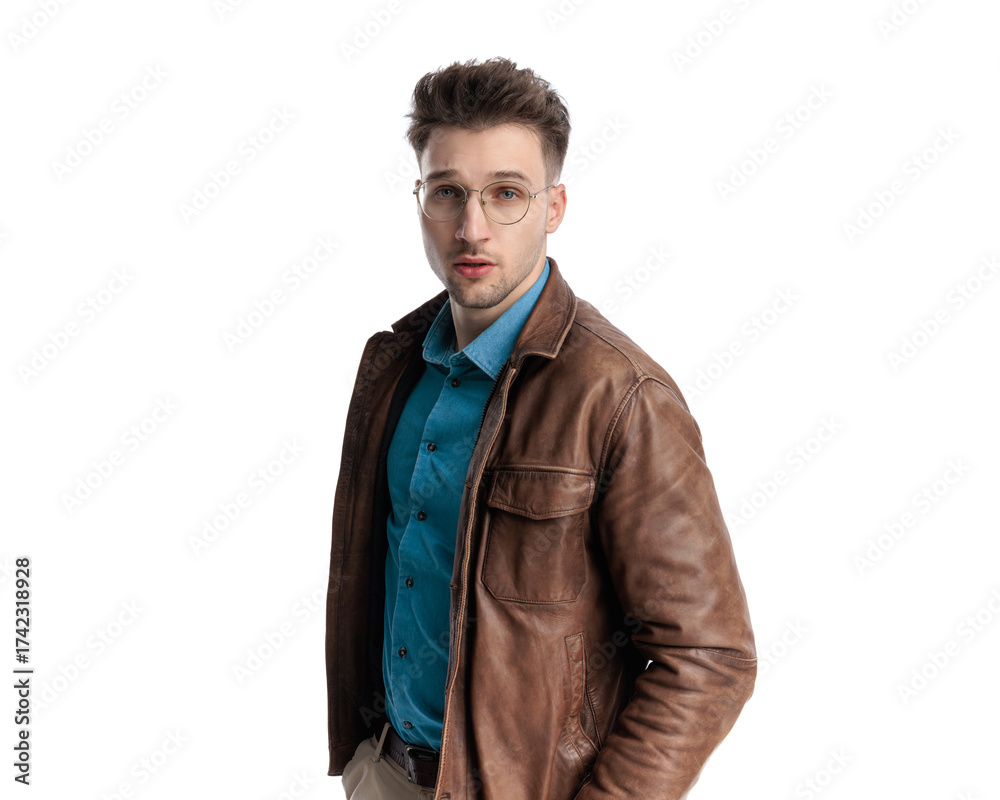 Fototapeta premium sexy casual man with glasses in black leather jacket holding hands in pockets