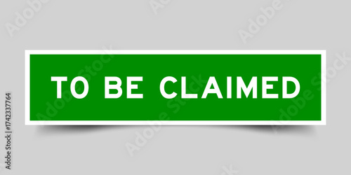 Green color square shape sticker label with word to be claimed on gray background