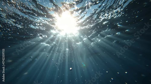 Sunlight Rays Underwater – Dreamy Blue Ocean Scene in 4K