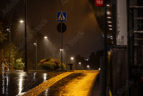Stockholm, Sweden A night view of an empty street in the rain of the city from the Kvarnholmen district.
