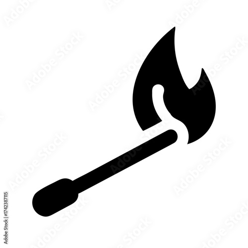 A close up of a black cat s face with piercing green eyes looking directly at the camera in a studio setting